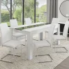Chaises blanches de salle à manger