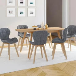 Chaises matelassées en tissu gris foncé pour salle à manger