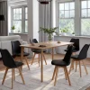 Chaises scandinaves noires avec coussin