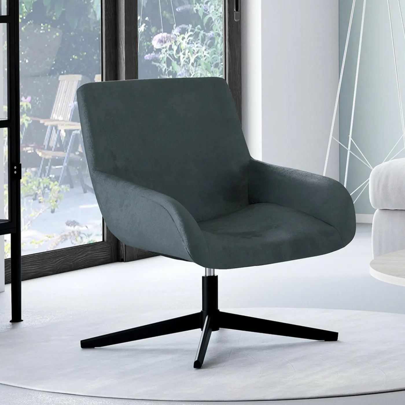 Fauteuil pivotant gris en velours et pieds noirs