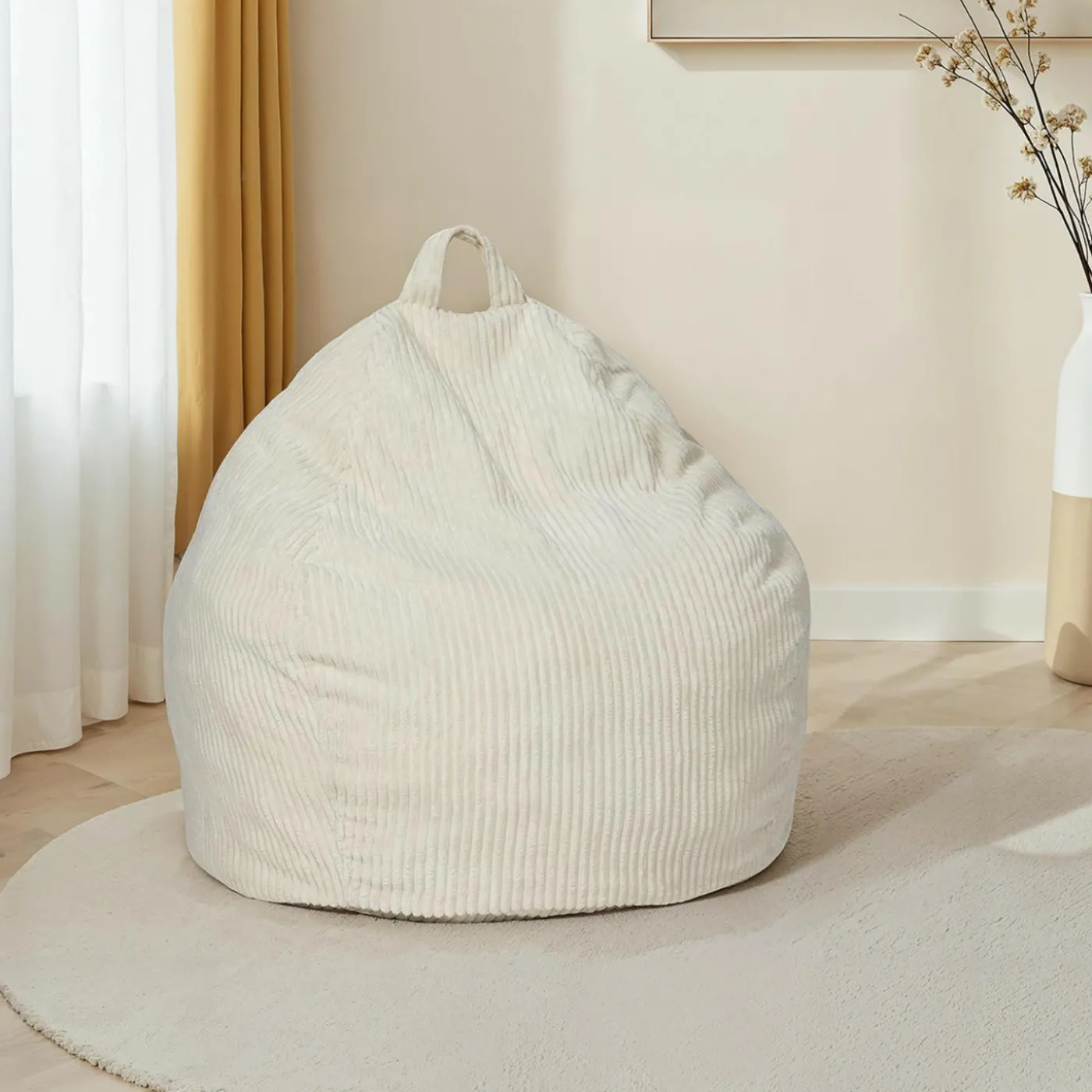 Fauteuil poire gros pouf en velours côtelé beige