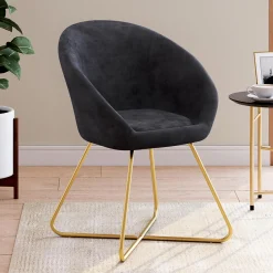 Fauteuil rond en velours gris avec pieds croisés dorés