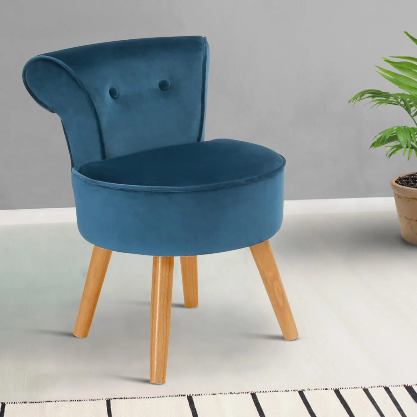 Petit fauteuil crapaud bleu en velours