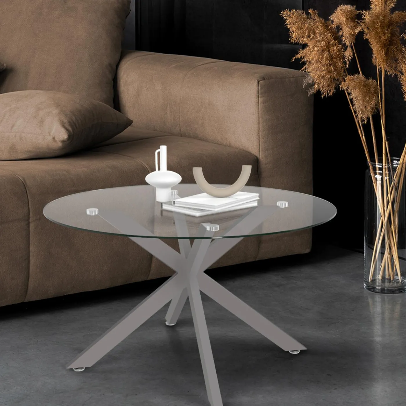 Table basse ronde avec plateau verre et pied acier effet chromé