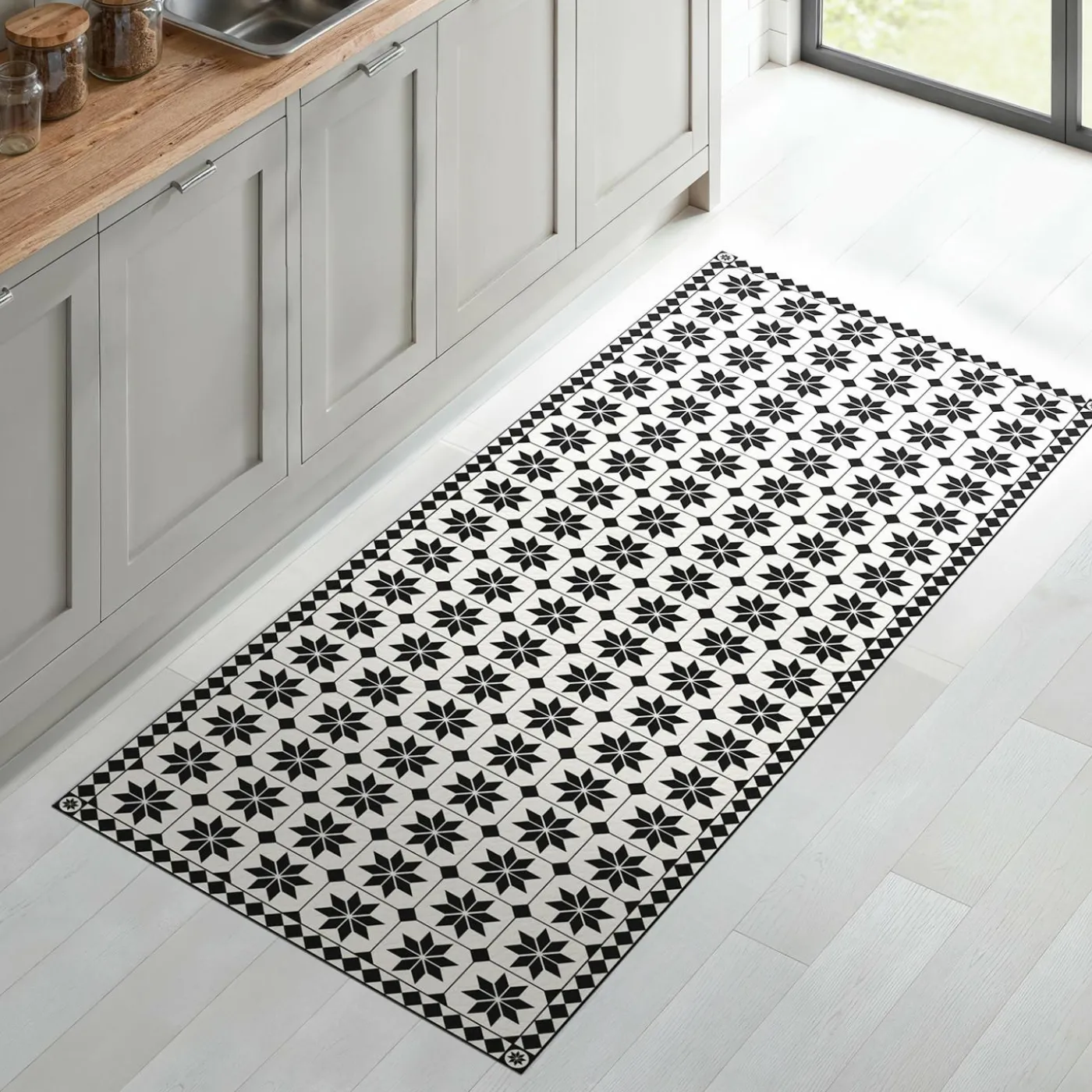 Tapis en vinyle effet mosaïque noir et blanc 66 x 160 cm