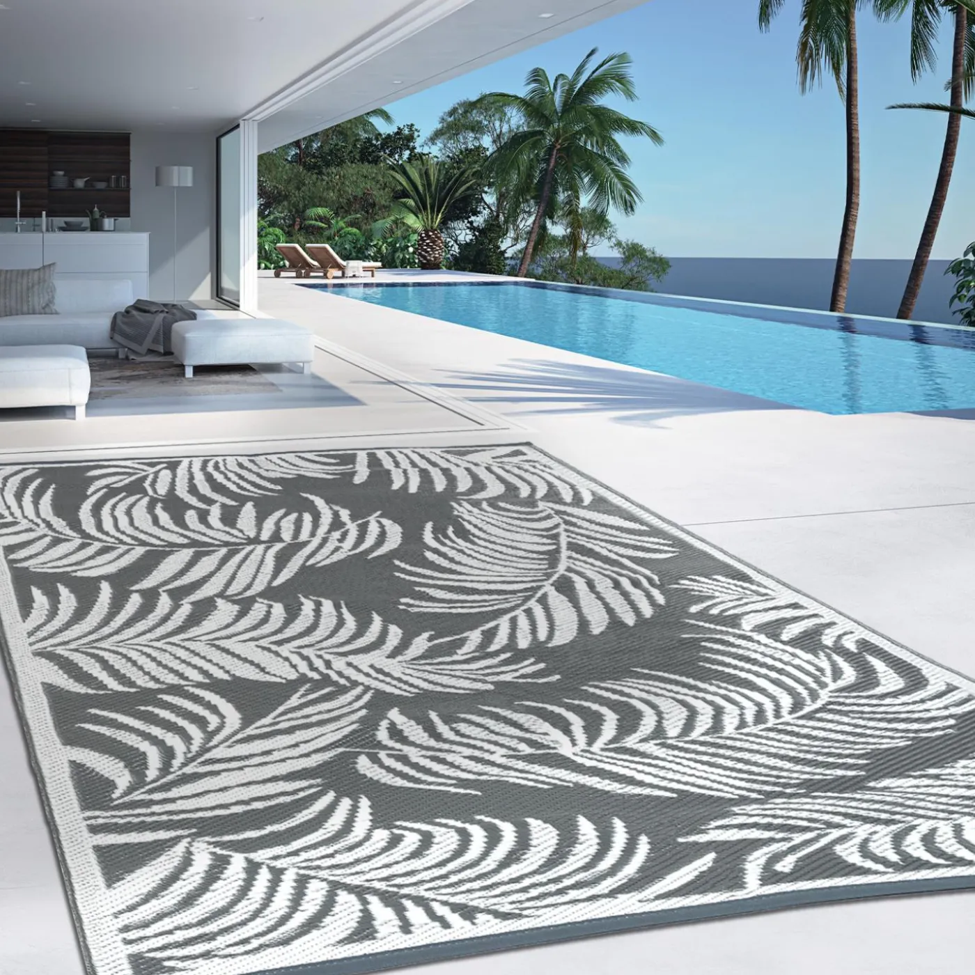 Tapis extérieur gris et blanc motifs tropicaux 270 x 370 cm