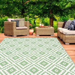 Tapis extérieur vert sauge et blanc motifs géométriques 180 x 280 cm